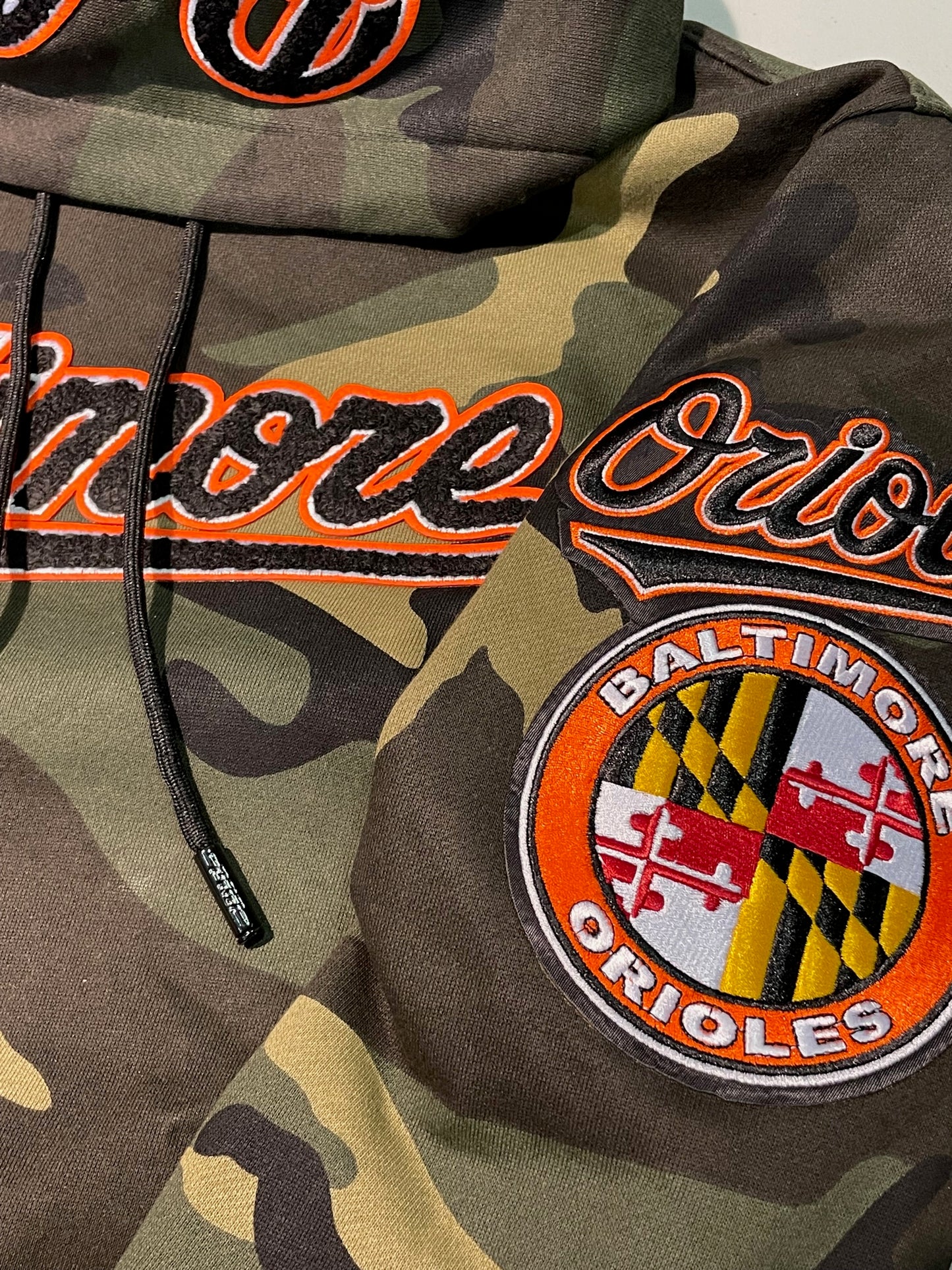 Baltimore Orioles Pro Standard Logo Pro Team Olive Camo Hoodie